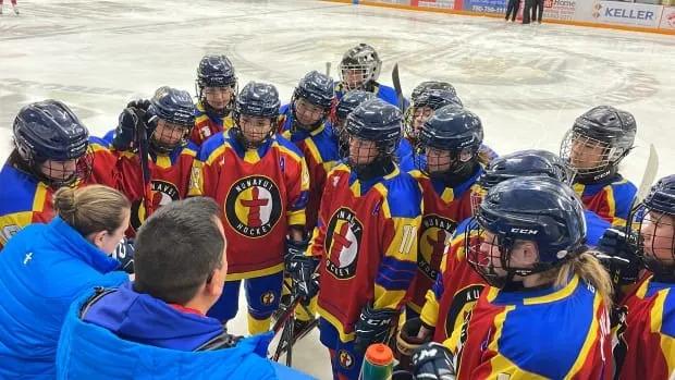 Young hockey players in Nunavut with their new equipment